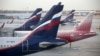 Passenger planes of the Aeroflot and Rossiya airlines are parked at Sheremetyevo airport in May 2021.