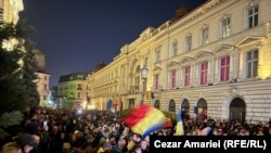 Protesters march in Bucharest on March 9 after Calin Georgescu's candidacy was rejected.