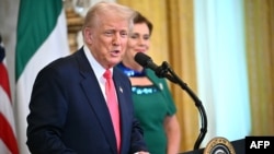 US President Donald Trump speaks to reporters in Washington, DC, on March 12. 